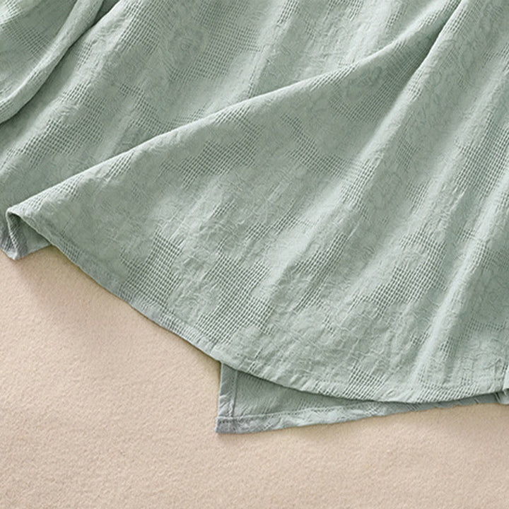 Buddha Stones ​​Jacquard-Baumwollhemd mit unregelmäßigem Saum und Faltenmuster, langärmelig - image 39