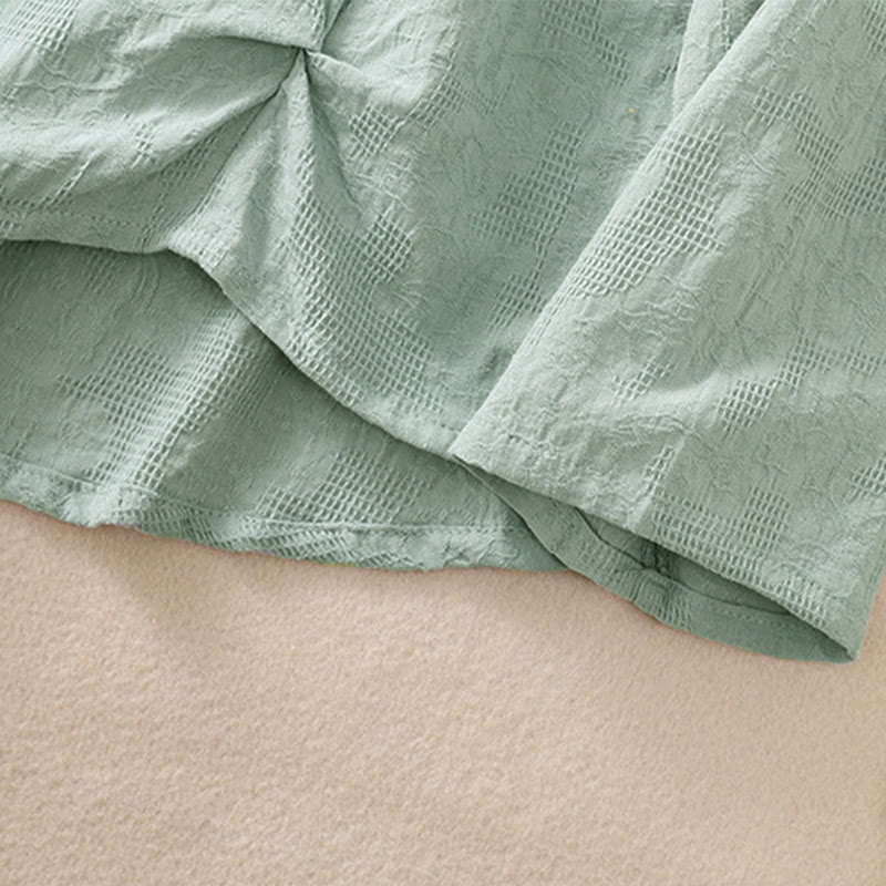 Buddha Stones ​​Jacquard-Baumwollhemd mit unregelmäßigem Saum und Faltenmuster, langärmelig - image 38