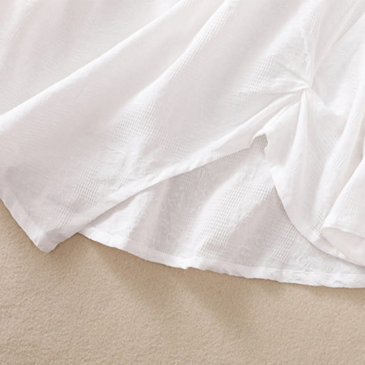 Buddha Stones ​​Jacquard-Baumwollhemd mit unregelmäßigem Saum und Faltenmuster, langärmelig - image 15