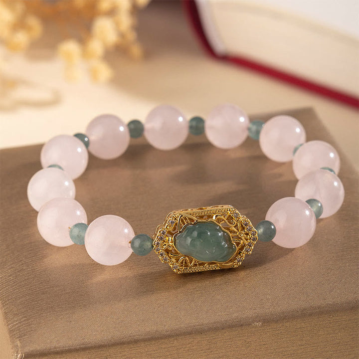 Buddha Stones aus Rosenquarz und Jade – Symbol der Fürsorge und Güte - Rosenquarz (Handgelenkumfang: 15-16 cm) - image 0