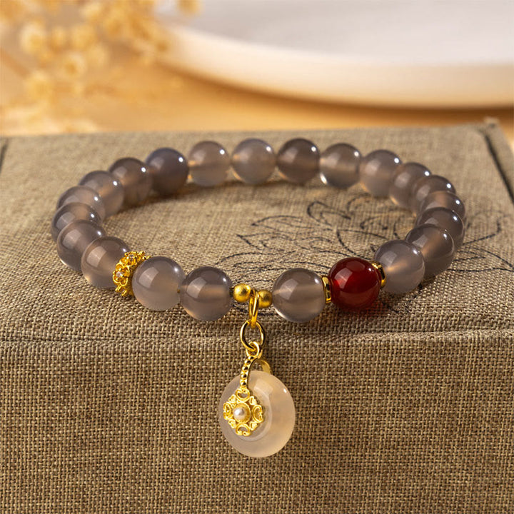 Buddha Stones, Grauer Achat, Roter Achat, Chalcedon-Bastel - Grauer Achat (Handgelenkumfang: 15-16 cm) - image 0