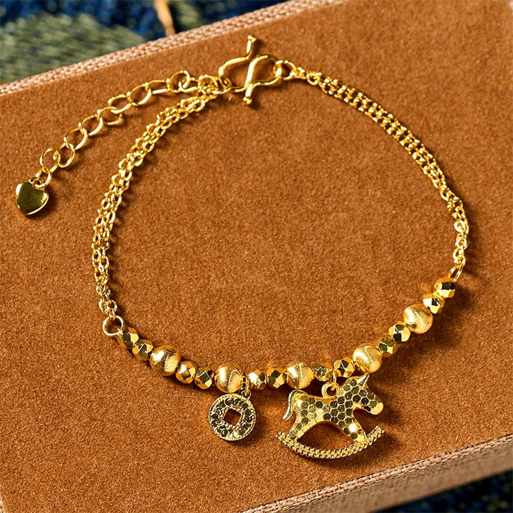 Buddha Stones, chinesisches Tierkreiszeichen, Jahr des Pferdes, 24 Karat vergoldetes Kupfermünzen-Glücksarmband - Pferd (Handgelenkumfang: 14-16 cm) - image 0