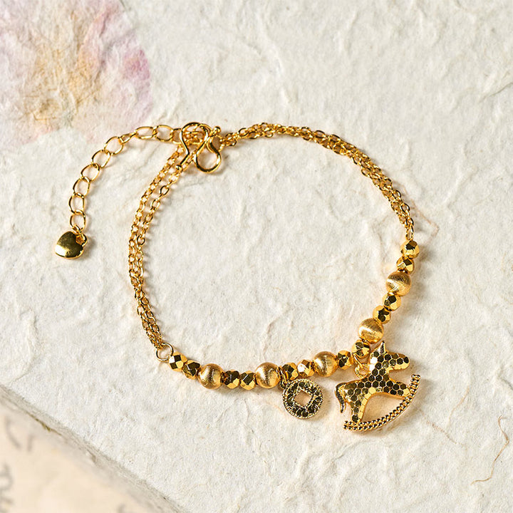 Buddha Stones, chinesisches Tierkreiszeichen, Jahr des Pferdes, 24 Karat vergoldetes Kupfermünzen-Glücksarmband - image 1