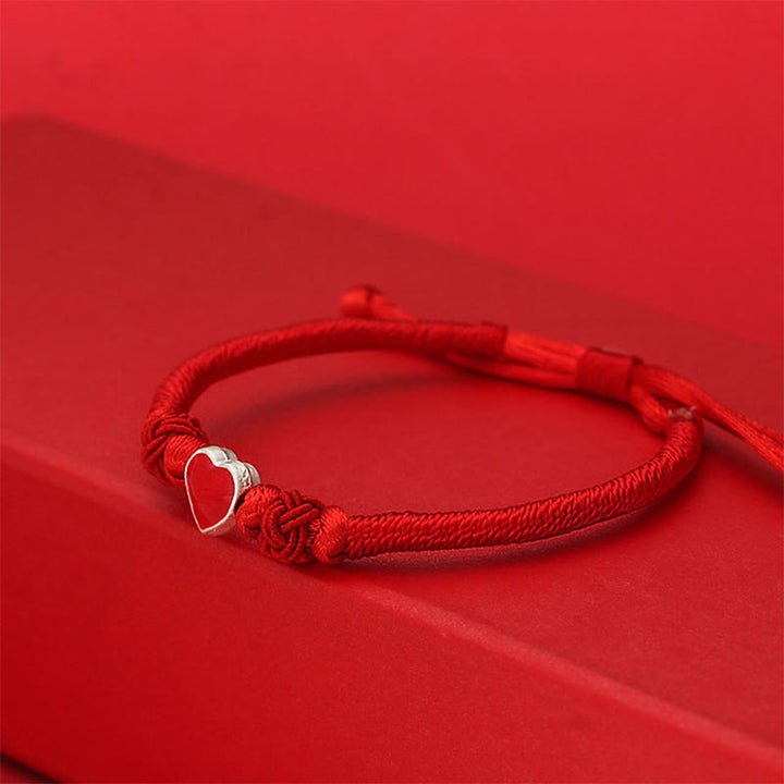Buddha Stones ​​Armband aus 999er Sterlingsilber mit 3D-Herzdesign und roter Schnur - image 1