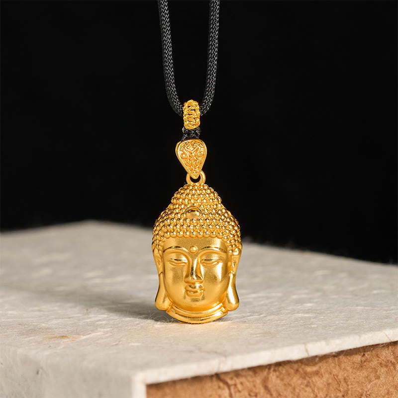 Buddha Stones aus 24-karätig vergoldetem Messing mit Buddha-Symbol und geflochtener Kordel – ein Symbol der Gelassenheit. - image 1