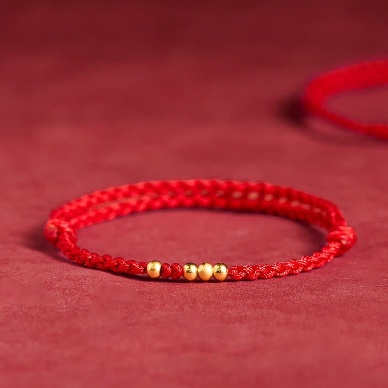Buddha Stones, 925er Sterlingsilber, vergoldete Perlen, rote Schnur, verstellbares Armband - Rotes Seil (Ein und drei goldene Perlen) - 14-23 cm - image 0