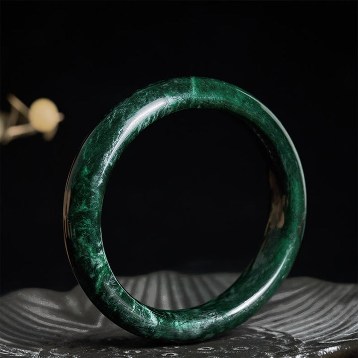 Buddha Stones ​​Nanyang Schwarz-Grüner Jade Schutz-Armreif - 62 mm - image 0