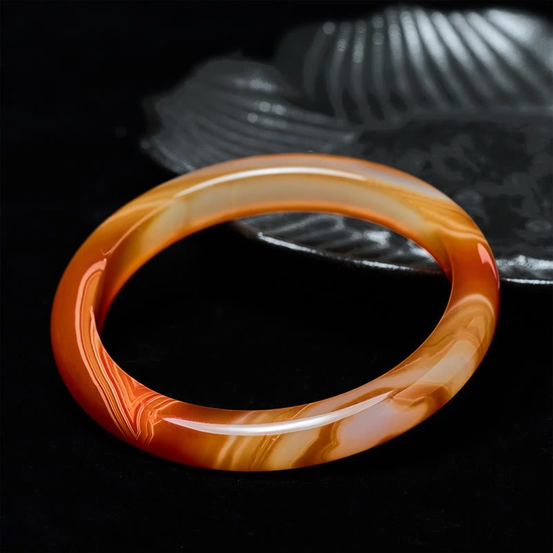 Buddha Stones Armreif mit geädertem Muster aus rotem Achat - image 1