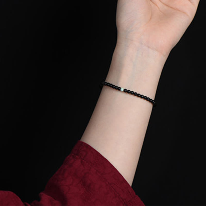 Buddha Stones aus schwarzem Obsidian und Türkis – Symbol für Stärke und Erfüllung - image 7