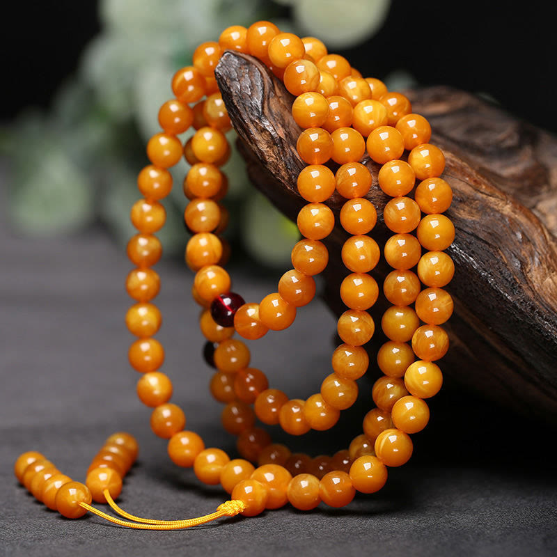 Buddha Stones ​​Tibetische Bernstein-Rundperlen-Mala - 10 mm - image 0