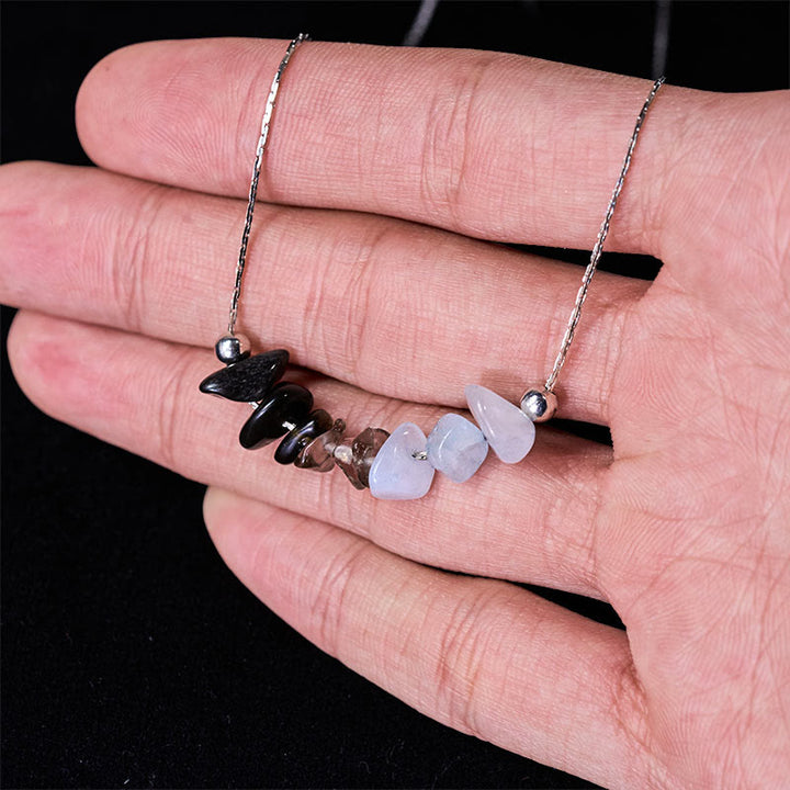 Buddha Stones: Halskette mit Anhänger aus schwarzem Obsidian, Rauchquarz, Granat, Aquamarin, Erdbeerquarz und rosa Kristall. - image 4