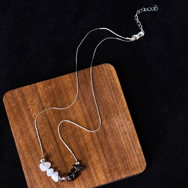 Buddha Stones: Halskette mit Anhänger aus schwarzem Obsidian, Rauchquarz, Granat, Aquamarin, Erdbeerquarz und rosa Kristall. - image 3