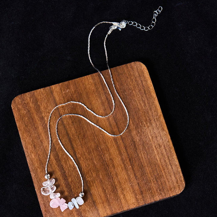 Buddha Stones: Halskette mit Anhänger aus schwarzem Obsidian, Rauchquarz, Granat, Aquamarin, Erdbeerquarz und rosa Kristall. - image 11