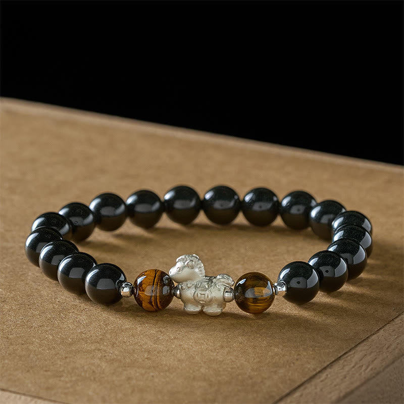 Buddha Stones ​​Jahr des Pferdes 999 Sterling Silber Pferdeanhänger Schwarzer Obsidian Tigerauge Stärke-Armband - image 1