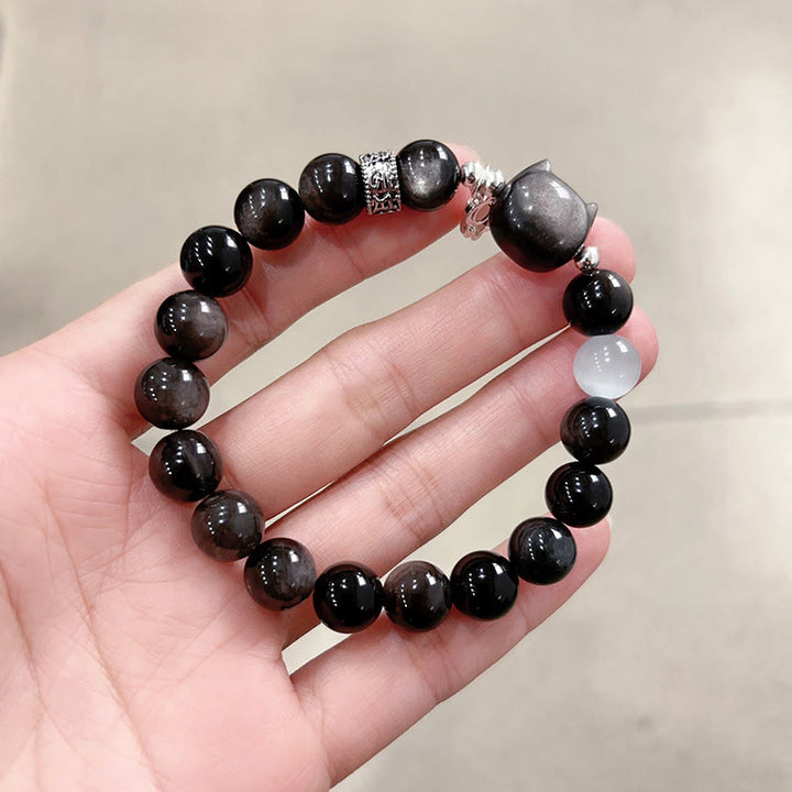 Buddha Stones Katzenkopf-Armband aus weißem Katzenauge mit silbernem Schimmer und Obsidian-Effekt - Obsidianperle mit Silberglanz, Größe 10 mm (Handgelenkumfang: 14-15 cm) - image 14