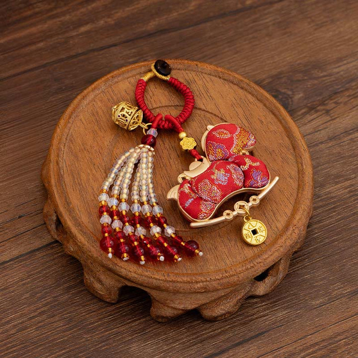 Buddha Stones Schlüsselanhänger mit Stickerei zum Thema Wohlstand im Jahr des Pferdes - Rotes Pferd (Größe: 10 x 5 cm) - image 0