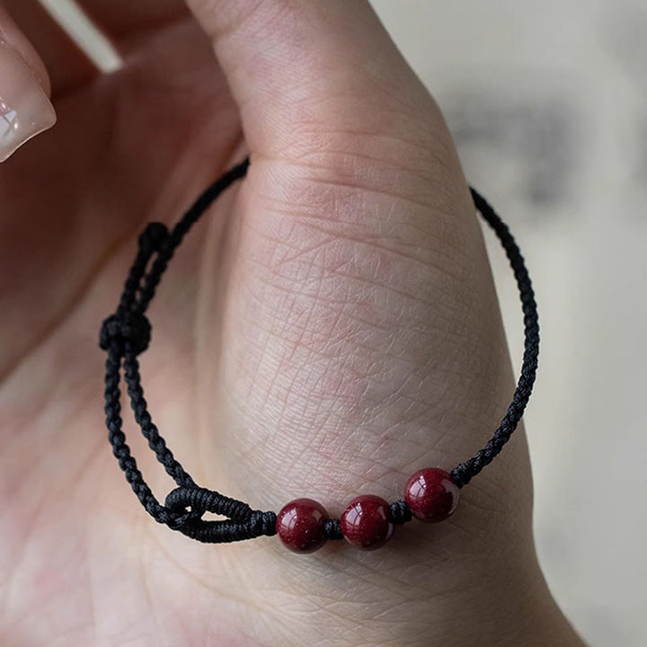 Buddha Stones Handgefertigtes Armband aus geflochtenem Seil mit Zinnoberperlen und dem Spruch „Ruhe und Segen“. - image 10