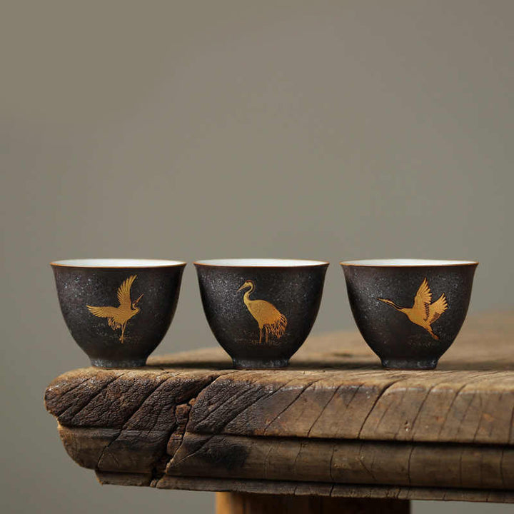 Buddha Stones Kleine handbemalte Keramik-Teetasse mit goldenem Kranichmotiv, Kung-Fu-Teetasse, 40 ml - image 0