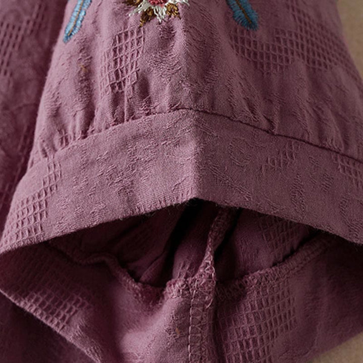 Lässiges Damen-T-Shirt mit Buddha Stones, floralem Muster und kurzen Ärmeln - image 3