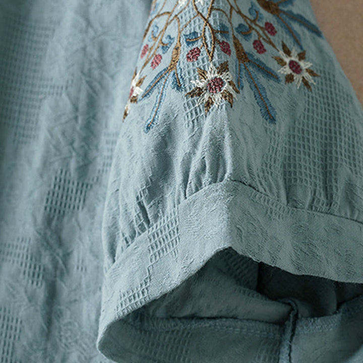 Lässiges Damen-T-Shirt mit Buddha Stones, floralem Muster und kurzen Ärmeln - image 10