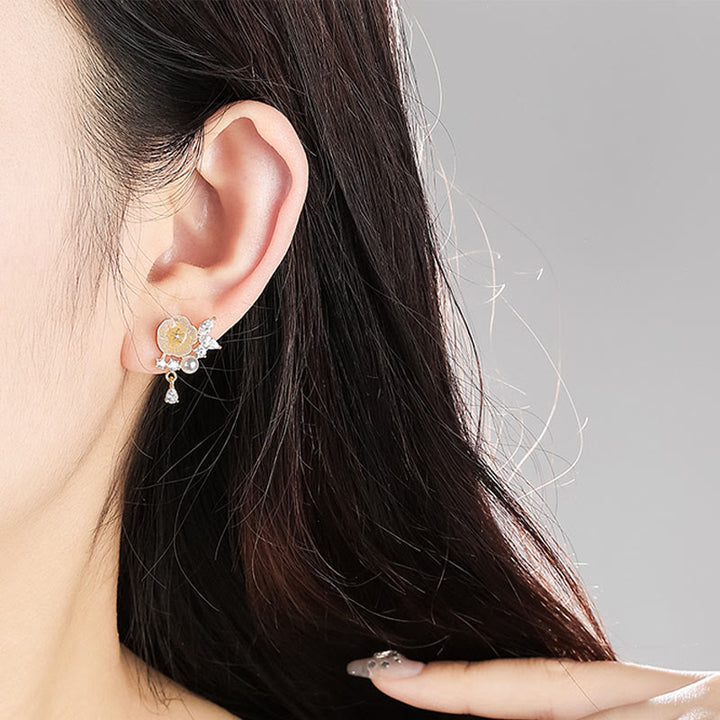 Buddha Stones Clip-Ohrstecker mit weißer Rose, Zirkonia und Kupferanhänger - image 3