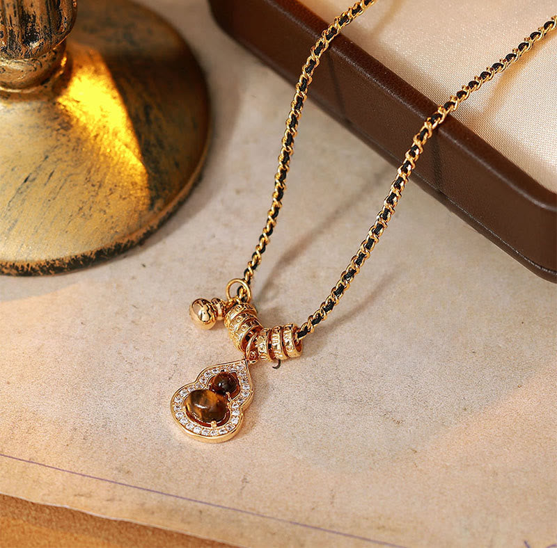 Buddha Stones Doppelkürbis-Tigerauge-Anhänger aus kupferplattiertem Gold - image 1