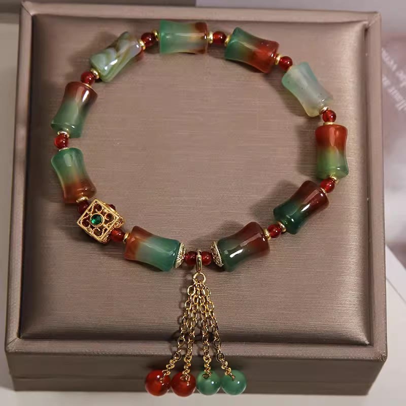 Buddha Stones Buntes Armband aus Pfauenachat-Bambusperlen mit Quaste – Mut-Armband - image 1