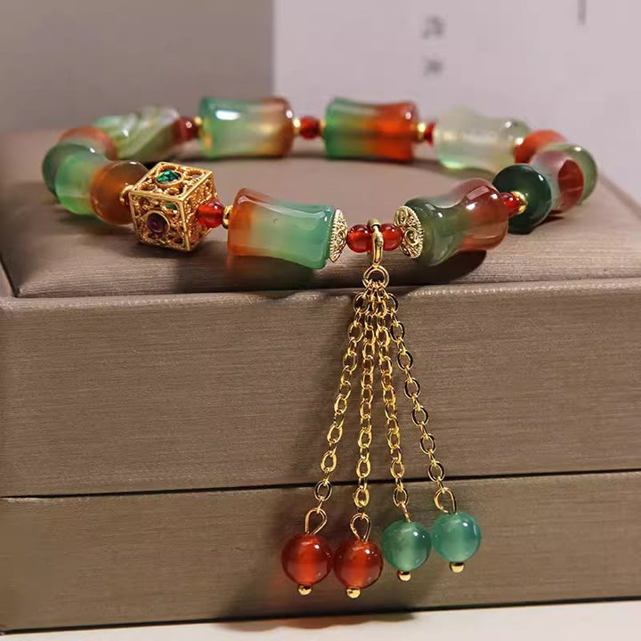 Buddha Stones Buntes Armband aus Pfauenachat-Bambusperlen mit Quaste – Mut-Armband - image 4