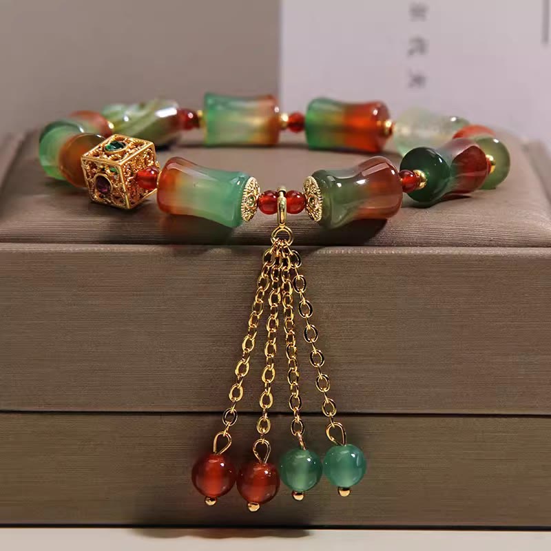 Buddha Stones Buntes Armband aus Pfauenachat-Bambusperlen mit Quaste – Mut-Armband - Pfauenachat (Handgelenkumfang 14-16 cm) - image 0