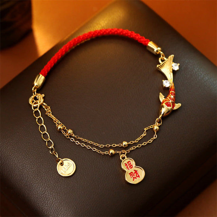 Buddha Stones Armband mit Koi-Fisch-Anhänger und rotem Band – Glücksbringer für Reichtum - image 1