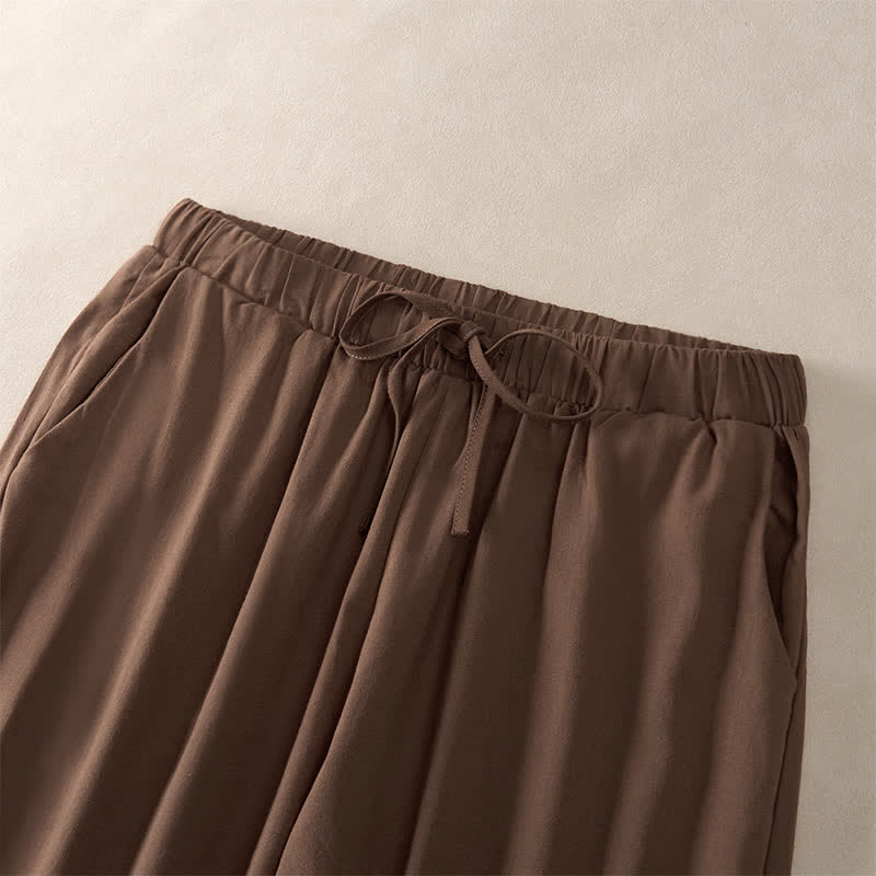 Buddha Stones Sommerliche, einfarbige Damenhose mit schmal zulaufendem Bein und Taschen, verziert mit Spitzensaum am Saum - image 1