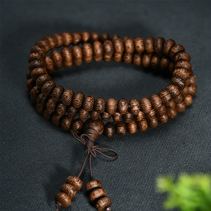 Buddha Stones Mala mit 108 strukturierten Holzperlen für ruhige Energie - image 1