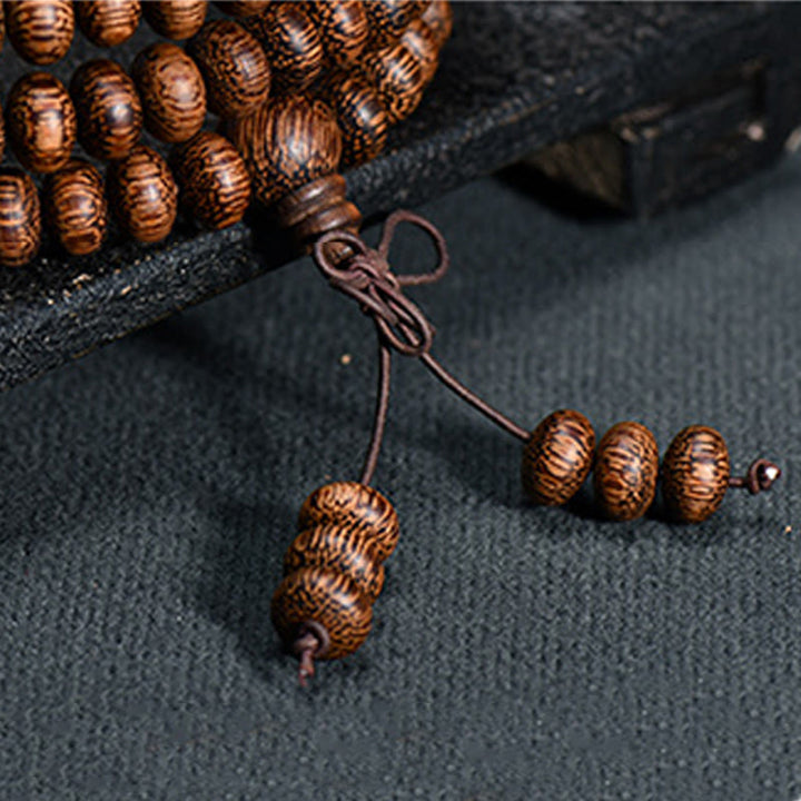 Buddha Stones Mala mit 108 strukturierten Holzperlen für ruhige Energie - image 6