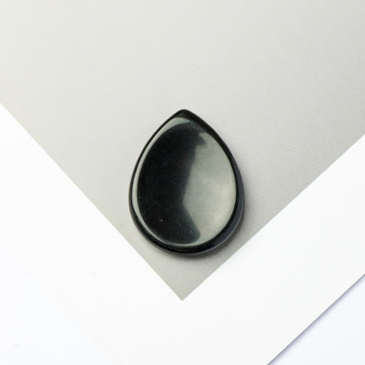 Buddha Stones Tropfenförmiger Sorgenstein-Schutzkristall, 34 x 26 x 7,8 cm - Natürlicher schwarzer Obsidian (Farbe kann variieren) - 34*26*7,8 mm - image 22