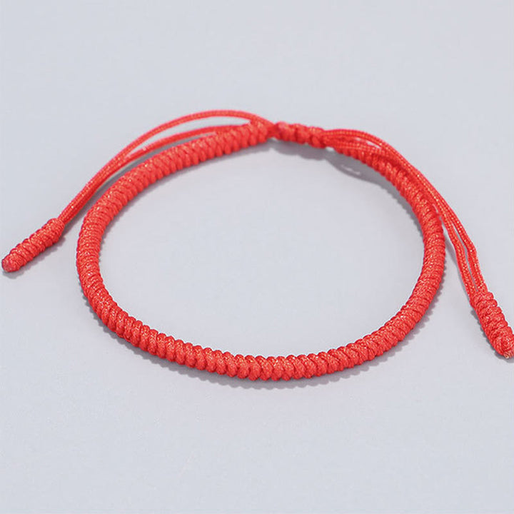 Buddha Stones 3-teiliges Armband aus goldenen Kupferperlen und roter Schnur - image 3
