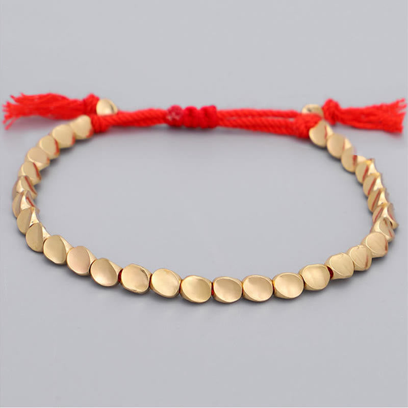 Buddha Stones 3-teiliges Armband aus goldenen Kupferperlen und roter Schnur - image 2