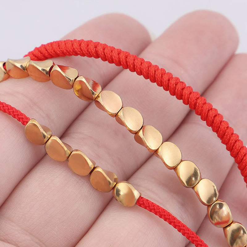 Buddha Stones 3-teiliges Armband aus goldenen Kupferperlen und roter Schnur - image 10