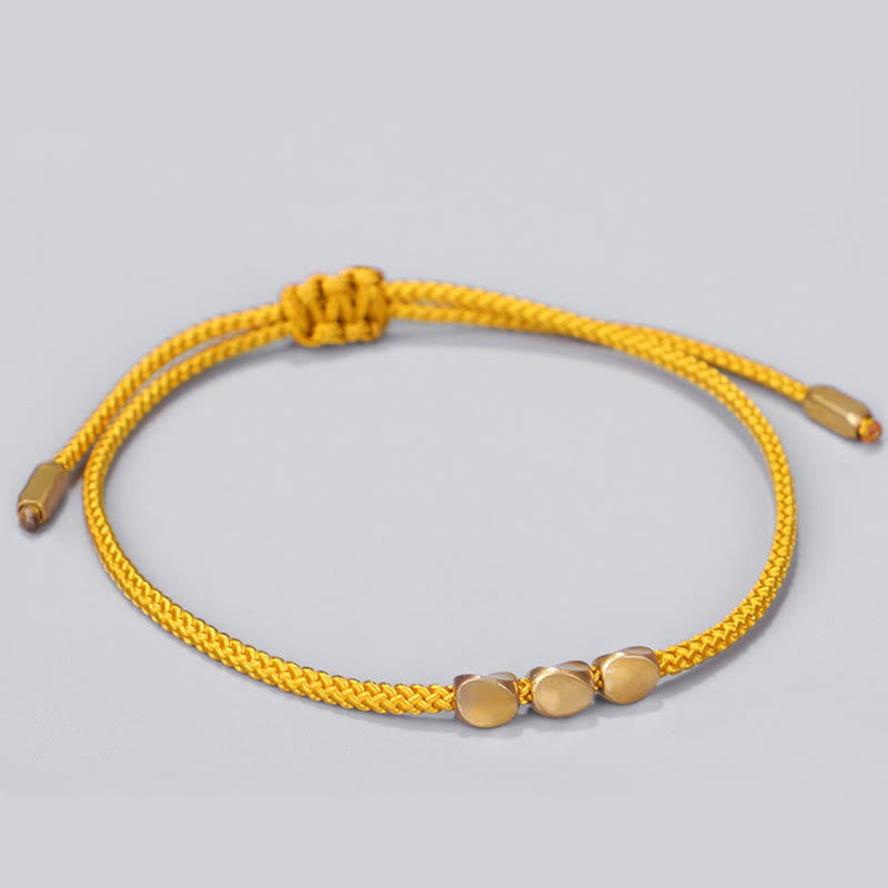 Buddha Stones 3-teiliges Heilarmband aus blauen und gelben Perlen aus goldenem Kupfer - image 2