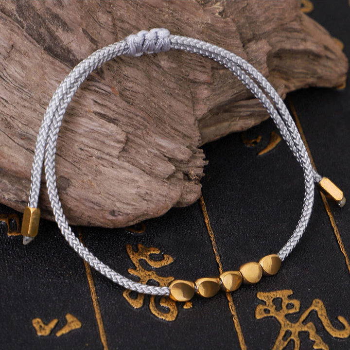 Buddha Stones 3-teiliges Selbstpflege-Armband aus blau-grauen, gold-kupferfarbenen Perlen - image 3