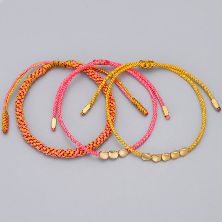Buddha Stones 3-teiliges Armband aus rosa-gelben, goldenen Kupferperlen - image 8