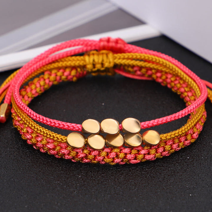 Buddha Stones 3-teiliges Armband aus rosa-gelben, goldenen Kupferperlen - image 3