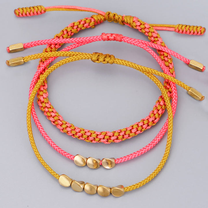 Buddha Stones 3-teiliges Armband aus rosa-gelben, goldenen Kupferperlen - image 2