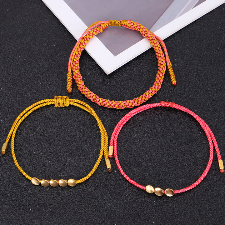 Buddha Stones 3-teiliges Armband aus rosa-gelben, goldenen Kupferperlen - image 9