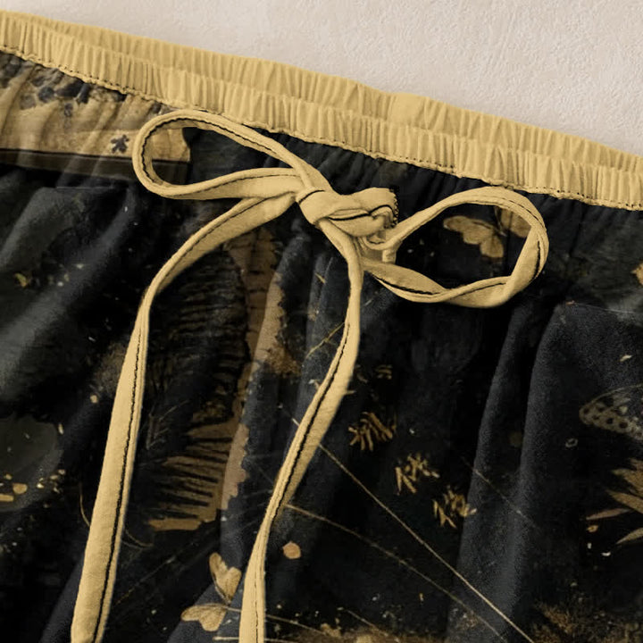 Buddha Stones Damenhose mit elastischem Bund und Taschen, verziert mit goldenem Schmetterlings-, Fächer- und Blumenmuster - image 1