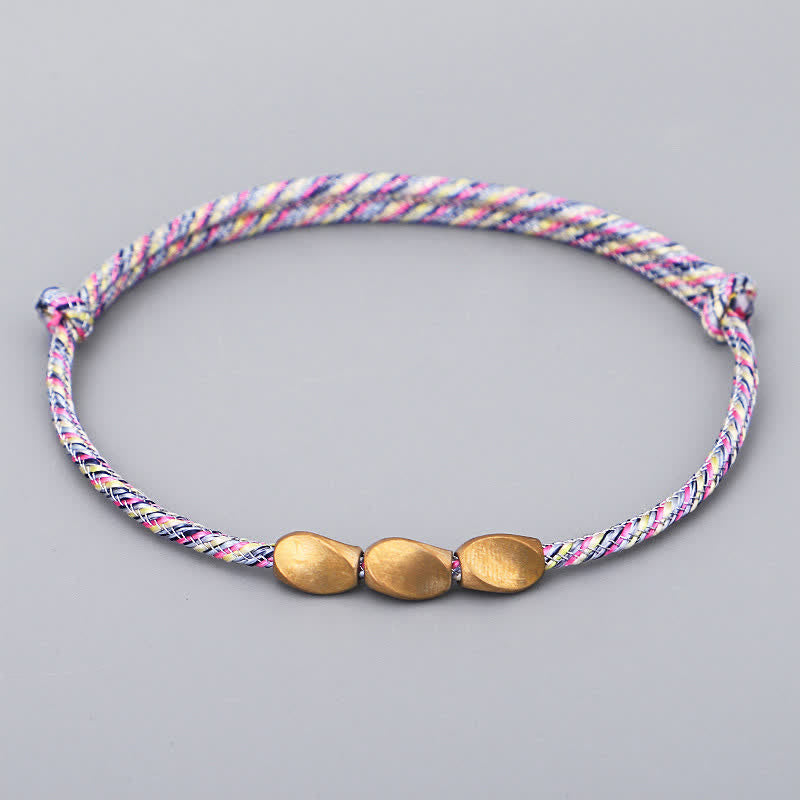 Buddha Stones Mehrfarbiges Balance-Armband aus gold-kupferfarbenen Perlen - Hellrosa - image 0