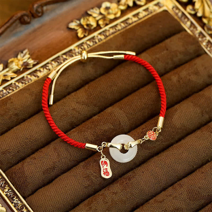 Buddha Stones Geflochtenes Segensarmband aus weißem Jade und rotem Faden mit Fu-Motiv - Weißer Jade - image 0