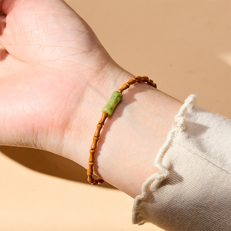 Buddha Stones Armband aus natürlichem Olivenkern, Peridot und Bambus im Schutzdesign - image 5