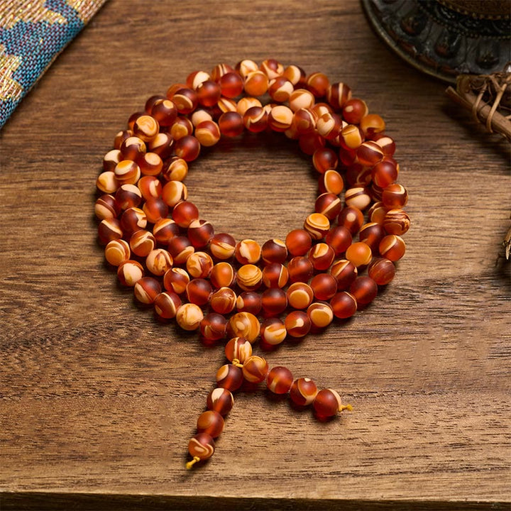 Buddha Stones Mala mit 108 runden tibetischen Bernsteinperlen zur Linderung von Angstzuständen - 10 mm - image 0