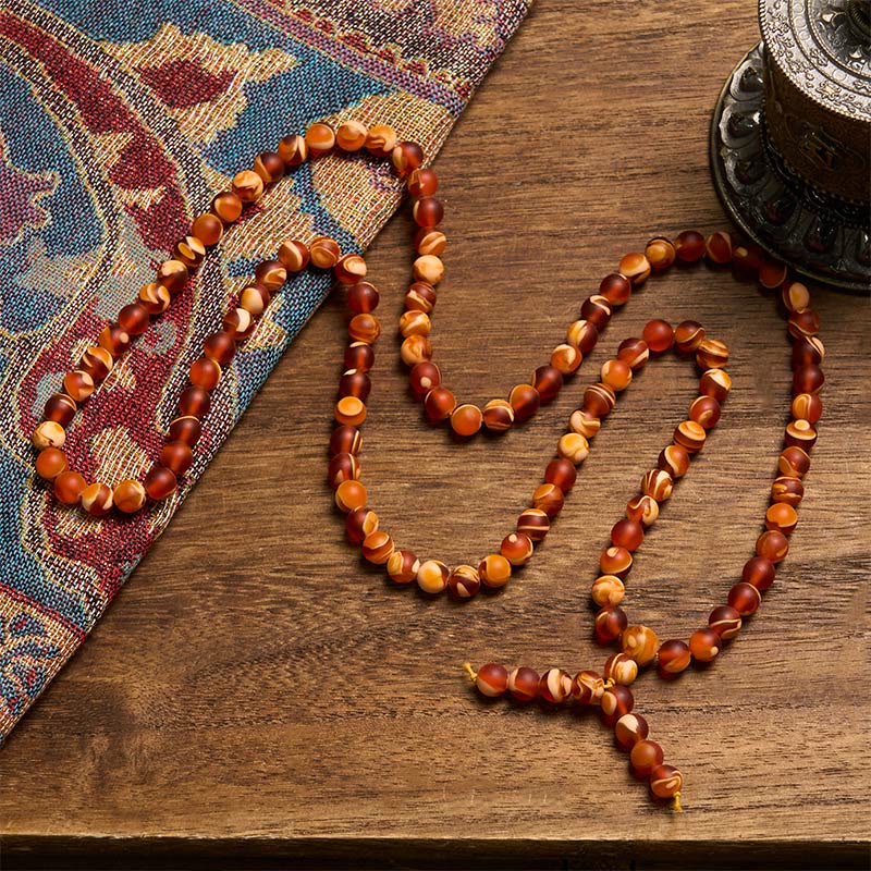 Buddha Stones Mala mit 108 runden tibetischen Bernsteinperlen zur Linderung von Angstzuständen - image 1