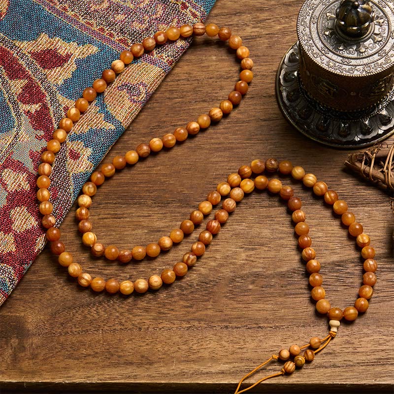 Buddha Stones Mala aus 108 harzreichen Kiefernholzperlen für beruhigende Energie - image 1